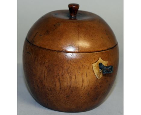 A WOODEN APPLE TEA CADDY.  4ins.