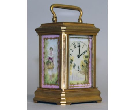 A MINIATURE BRASS AND SEVRES PORCELAIN CARRIAGE CLOCK. 7.5cms high.