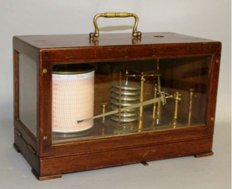 A WILSON WARDEN & CO OAK CASED BAROMETER, No. 4759/44. 12ins long.