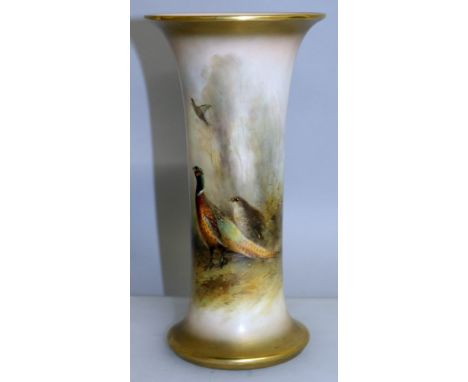 A ROYAL WORCESTER SPILL VASE, No. G 923, painted with pheasants by JAMES STINTON. 8.5ins high.