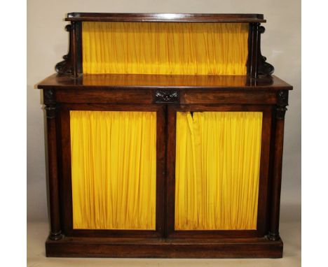 A REGENCY ROSEWOOD CHIFFONIER, with a galleried shelf over two frieze drawers, a pair of doors supported on a plinth base. 4f