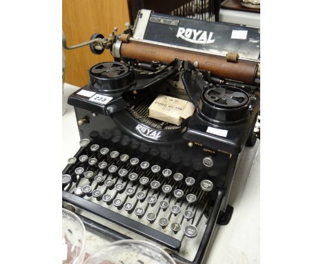 A vintage Royal typewriter Condition reports provided on request by email for this auction otherwise items purchased `as seen