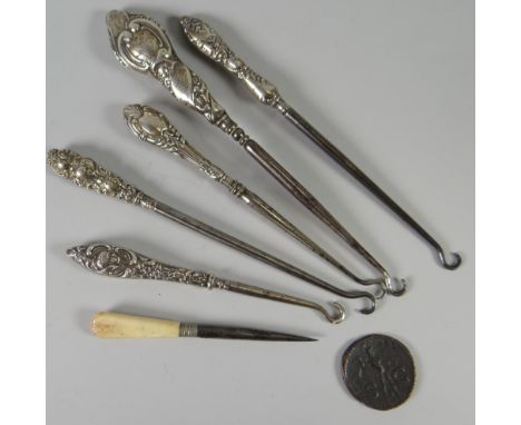 Parcel of silver handled button hooks ETC Condition reports provided on request by email for this auction otherwise items pur