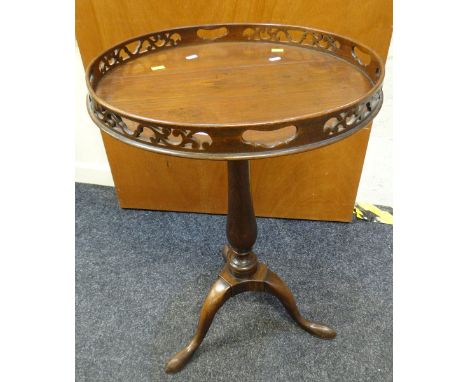 An antique mahogany galleried tripod table Condition reports provided on request by email  for this auction otherwise items p