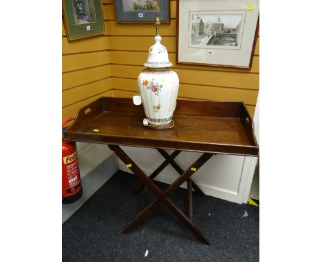 A mahogany folding butler's tray &amp; an Oriental-style pottery table lamp Condition reports provided on request by email fo