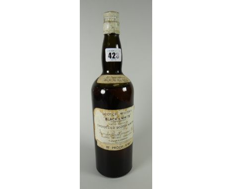 A bottle of James Buchanan &amp; Co Black &amp; White scotch whisky circa 1920s Condition reports provided on request by emai