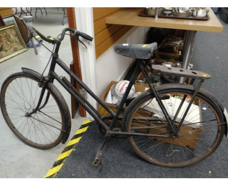 A vintage Raleigh Sports model push bike circa 1950s with original pump Condition reports provided on request by email  for t