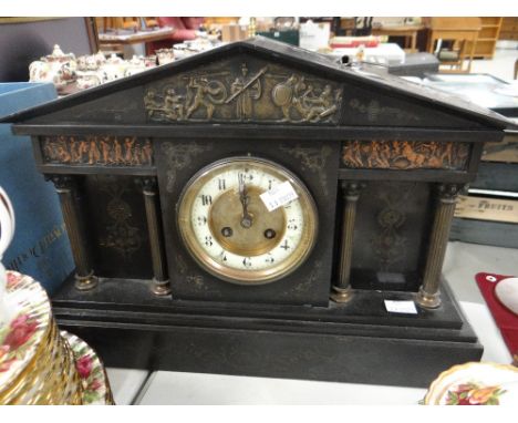 An antique architectural slate mantel clock Condition reports provided on request by email for this auction otherwise items p