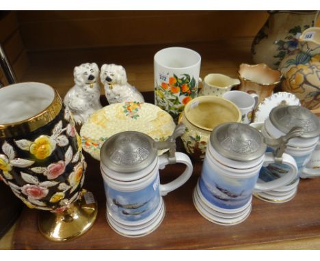 A parcel of pottery including Clarice Cliff Celtic Harvest cake stand, pair of Royal Doulton seated dogs, trio of aviation be