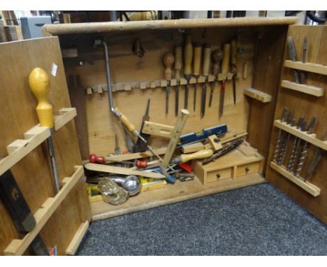 A wooden carpenters cabinet of tools Condition reports provided on request by email for this auction otherwise items purchase