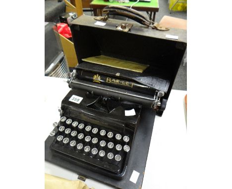 A Bar-Let vintage typewriter in a case Condition reports provided on request by email for this auction otherwise items purcha