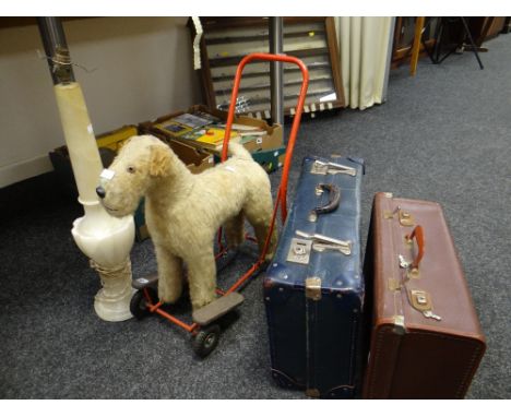 An early to mid-century infant's push-along soft-toy dog, an alabaster table lamp &amp; two items of vintage luggage Conditio