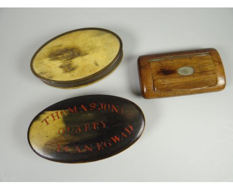 A horn carved oval snuff box with painted lettering 'Thomas Jones Quarry, Llanegwad' together with a plain oval horn snuff bo