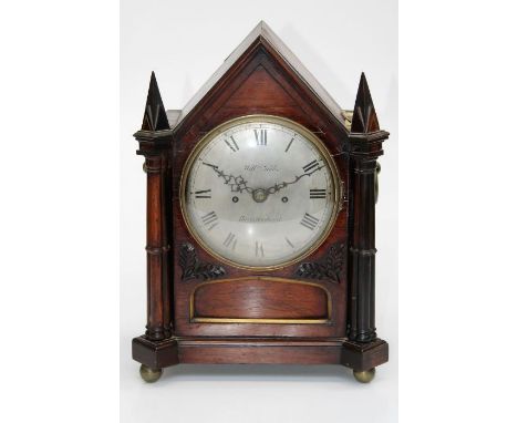 William Gibbs, Haverfordwest, an early 19th century rosewood bracket clock, the Gothic Revival architectural case enclosing a