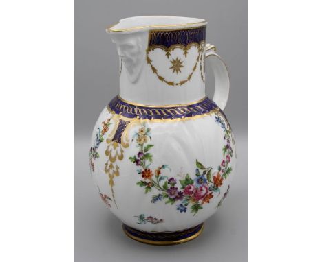 A 19th centruy Samson cabbage moulded mask head jug, polychrome enamel decorated with swags, sprays and festoons of flowers. 