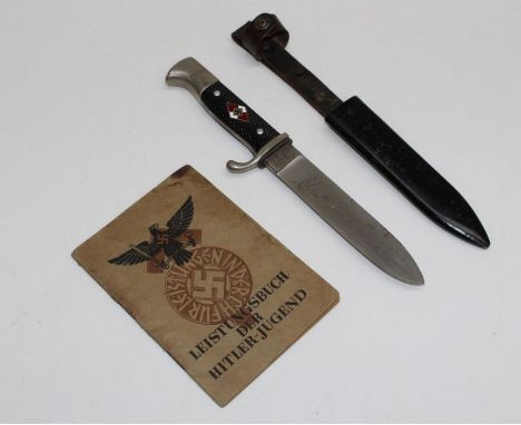 A WWII Hitler Youth hand book, together with a dagger, the 14cm blade etched ' Blut und Ehre. Numbered M 7/2, dated 1937. In 