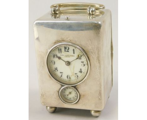 A late 19th/early 20thC Italian carriage clock, the white metal case with a loop handle, the enamel dial signed Musy Padre an
