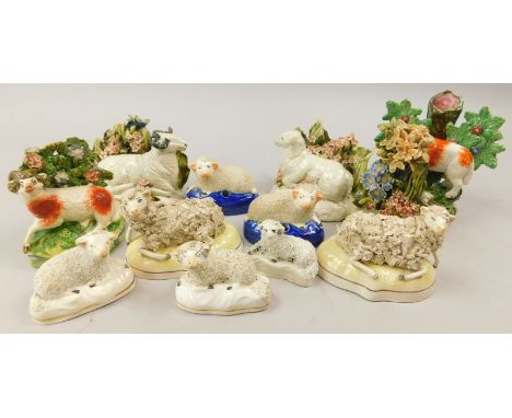 A collection of ceramic sheep, to include Staffordshire type examples, Studio Pottery bocage pieces, reproductions etc.