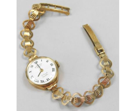 A Rotary 9ct gold wristwatch, with a small white enamel dial, on a fan design bracelet, 11.6g all in. 