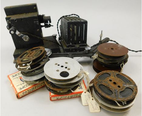 A Hunter 9-5 sub-standard cine projector, with 9.5mm films and some Pathescope films etc.