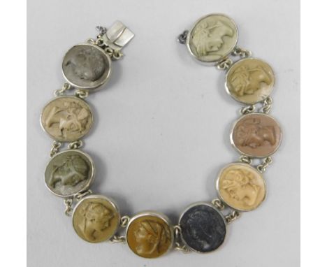 A Grand Tour type bracelet, with various Intaglio carved lava beads, on white metal, unmarked. 