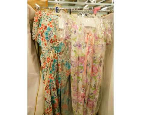 A quantity of ladies' vintage clothing, to include a floral pattern tea dress, further day dresses, faux fur light coloured c