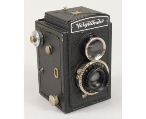 A Voigtlander Brilliant camera, with metal case, Compur shutter etc.