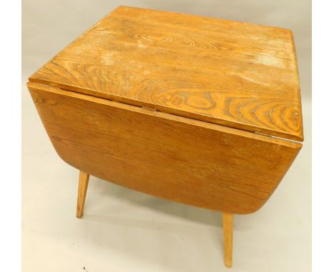 An Ercol light elm drop leaf kitchen table, on tapering legs, 73cm wide