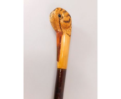 A modern walking stick, the handle carved in the form of a bird, 183cm high