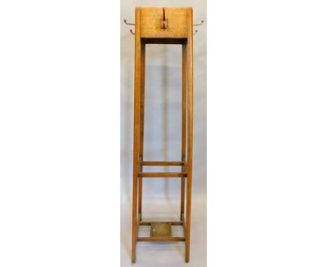 An early to mid 20thC oak coat and umbrella stand, with four copper double hooks, of tapering form, with metal drip pan, 170c
