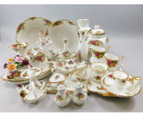 A quantity of Royal Albert Old Country Roses pattern ceramics, to include a figure, vases, dishes, candlestick etc.