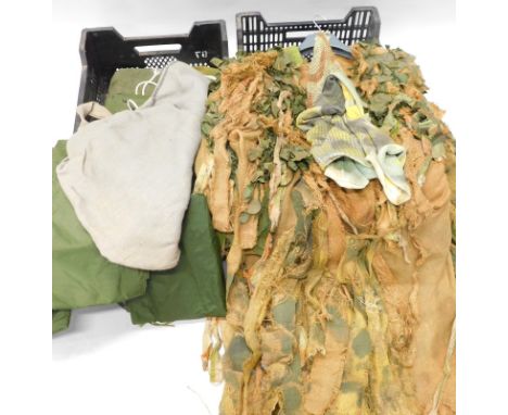 A quantity of army related clothing etc.