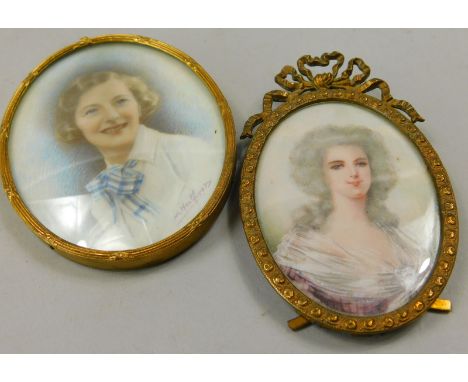 Two 20thC portrait miniatures, one depicting a lady in 18thC dress within an elaborate gilt metal frame, the other signed J H