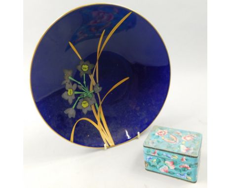 Two oriental items, a Japanese style charger decorated with flowers on a deep blue ground, signed to underside in gilt and a 