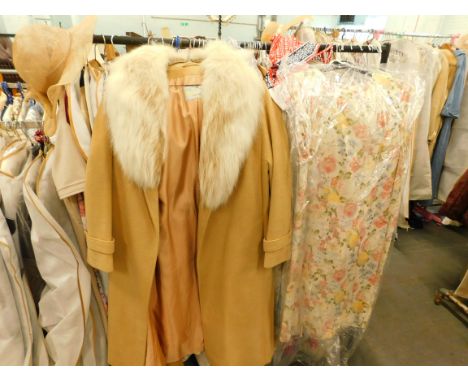 Various ladies' vintage clothing, to include day dresses, faux fur jackets etc. (one rail)
