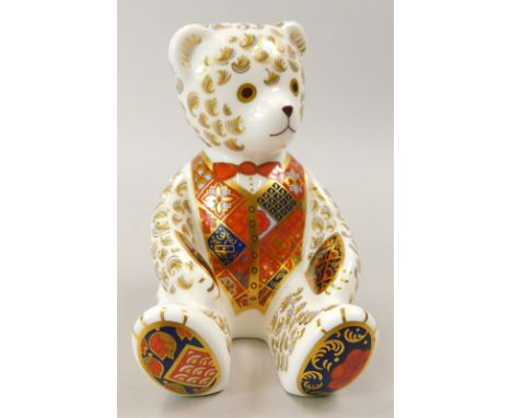 A Royal Crown Derby porcelain teddy bear, limited edition of 950 from Goviers of Sidmouth, gold button stamp