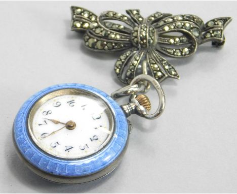 A silver and enamel fob watch, the fob watch in blue enamel with a raised floral design set with marquise design, with a whit