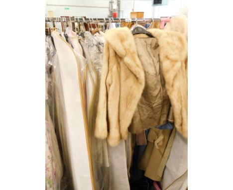 A quantity of ladies' vintage clothing, to include a David Parry mac, faux fur jacket, denim day dress, further day dresses e