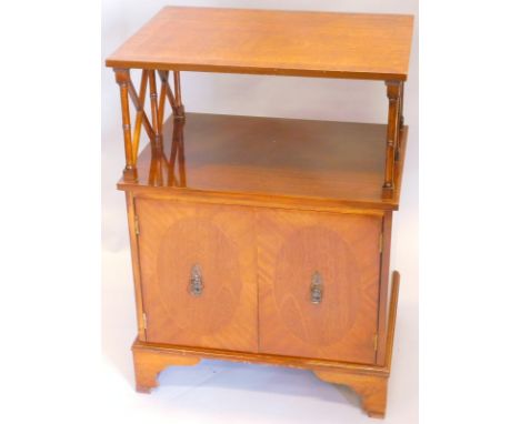A mahogany whatnot, the rectangular top with a boxwood strung and cross banded border on turned supports, the base with two f