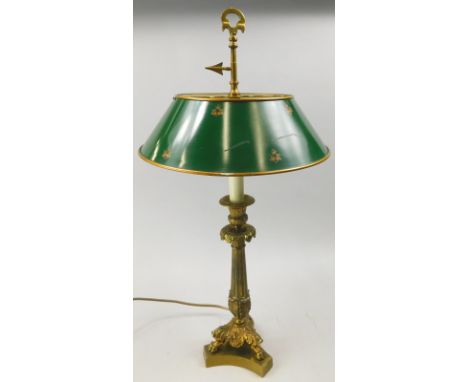 A gilt brass column standard lamp, in Empire style, with cream painted tin shade
