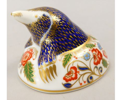 A Royal Crown Derby porcelain mole paperweight, gold button to underside