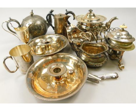 A collection of silver plated items, to include a bullet shaped teapot, a pair of chamber type candlesticks etc.