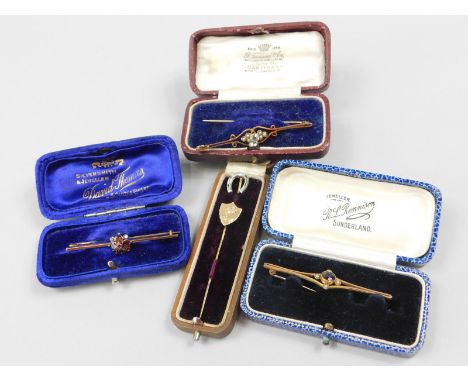 Various brooches and stick pins, to include three 9ct gold stone set bar brooches, a gold shield stick pin and a silver horse