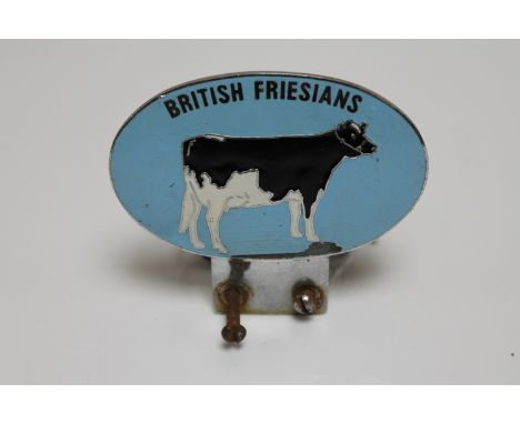 A vintage British Friesians car badge