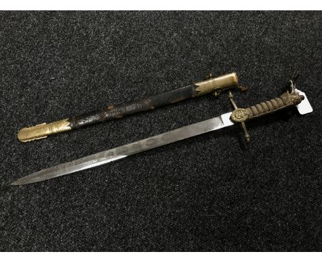 A George V naval officer's dirk in brass and leather scabbard with shagreen hilt