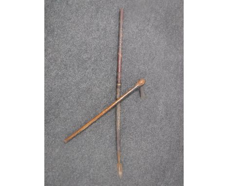A tribal spear and axe