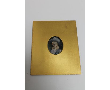 A nineteenth century portrait miniature depicting a lady wearing a blue dress and hat.