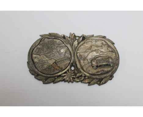 A vintage German car badge