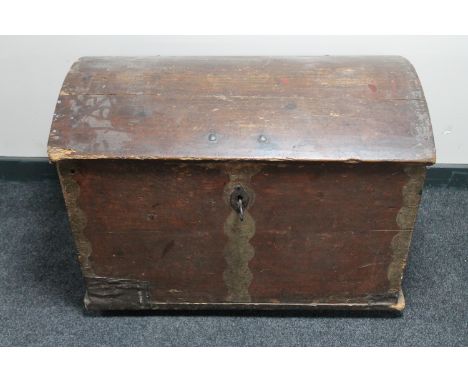 A 19th century pine domed topped shipping trunk 