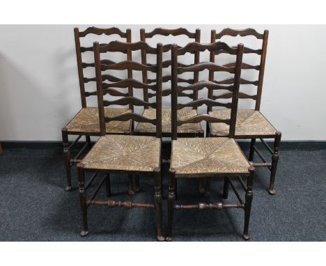 A set of five antique oak ladder back country kitchen chairs 
